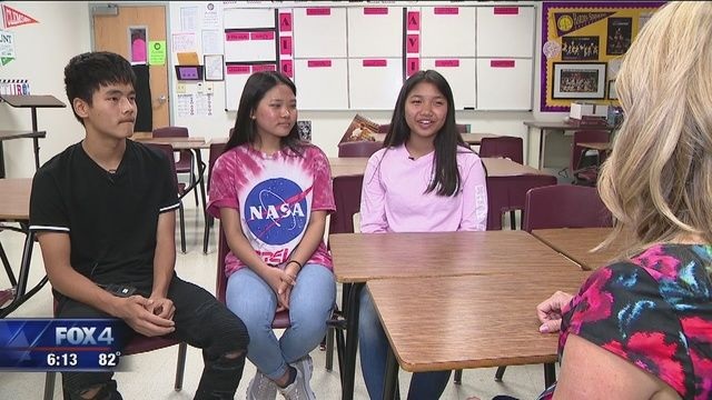 3 Chin students from Lewisville, Texas sit in a classroom with a KDFW Fox 4 news reporter to talk about satisfying a foreign language requirement through an Avant STAMP WS test.